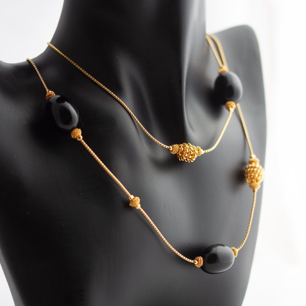 Trifari Signed long necklace.